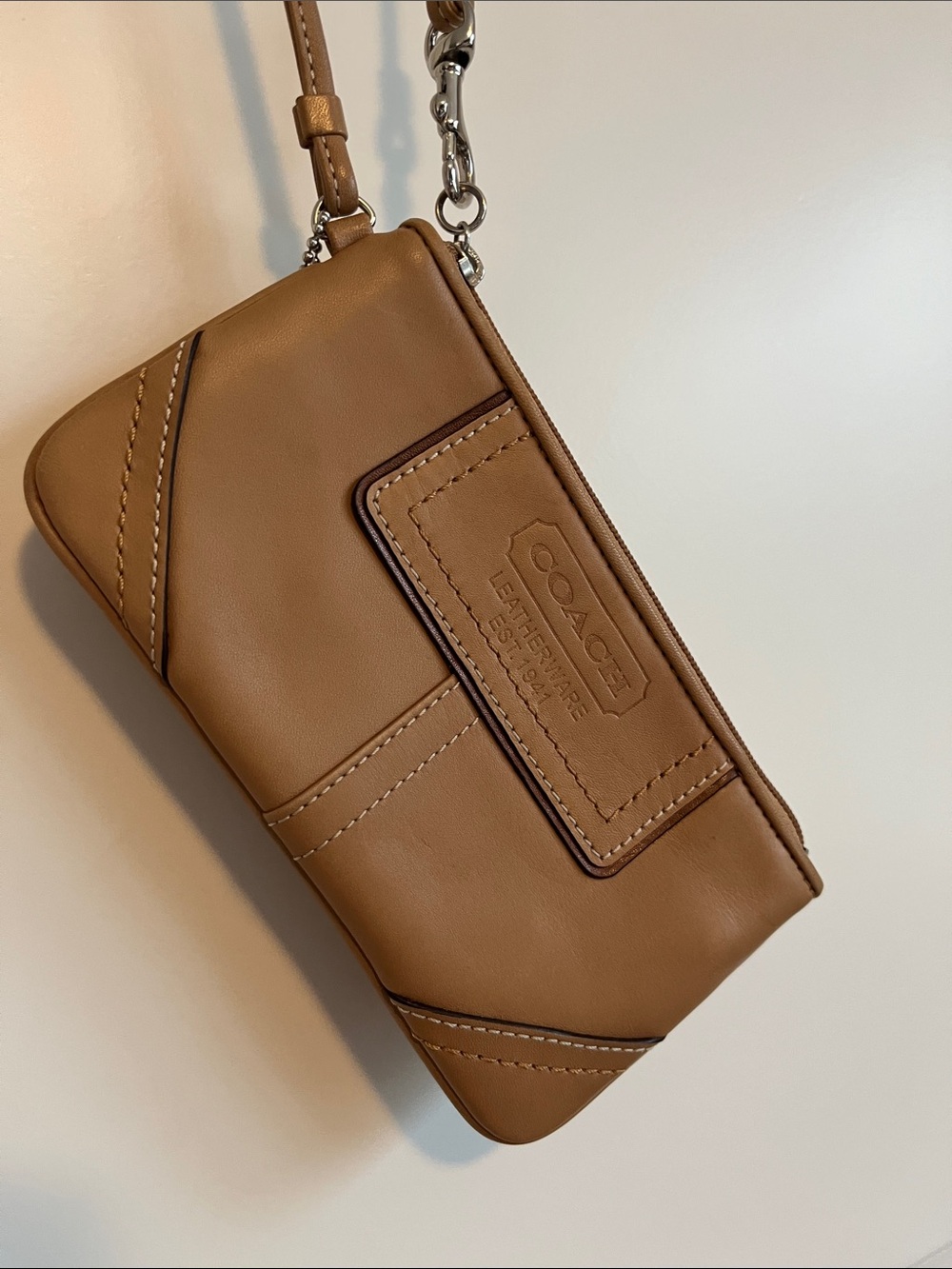 COACH Tan Leather Wristlet Pouch with Embossed Logo